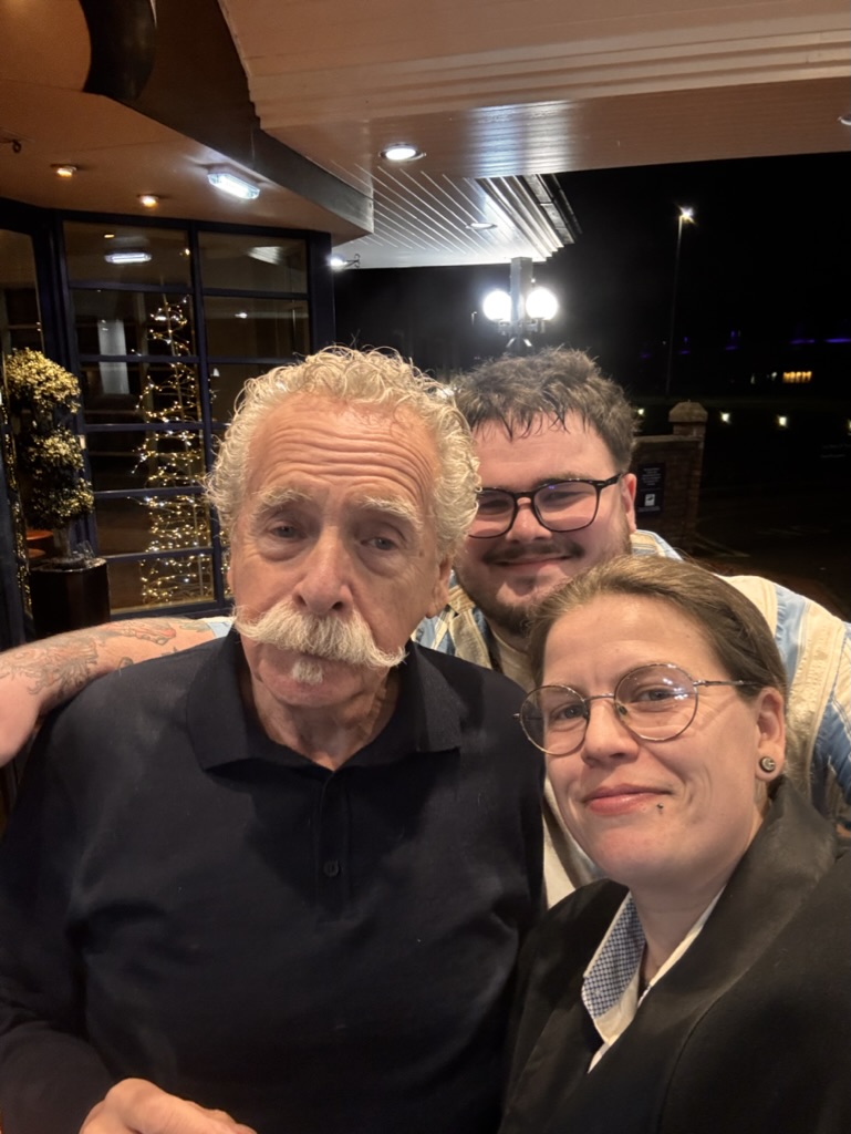 Sophie, Joe and Charlie outside Hilton Hotel on our Christmas Party